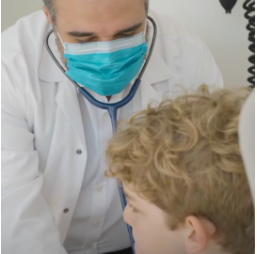 questions to ask about stem cell therapy Stem cell doctor talking to a boy about stem cell treatment