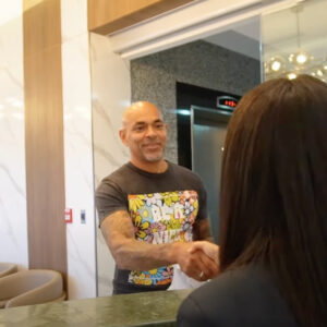 Stem Cell Therapy for Lupus David shaking the hand of a Stem Cell Institute patient coordinator